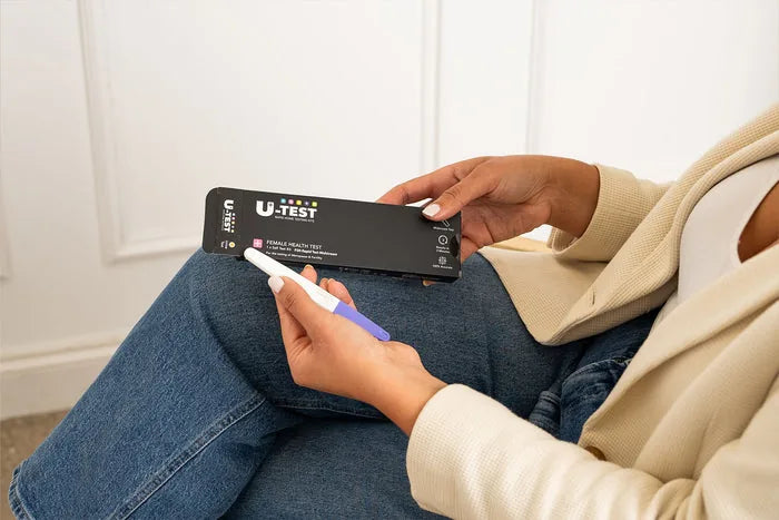 A person reading an at-home test result