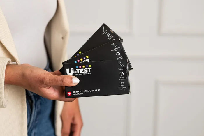 A person preparing an at-home test kit